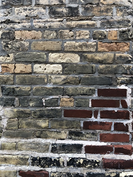 <Image: Old brick wall.>